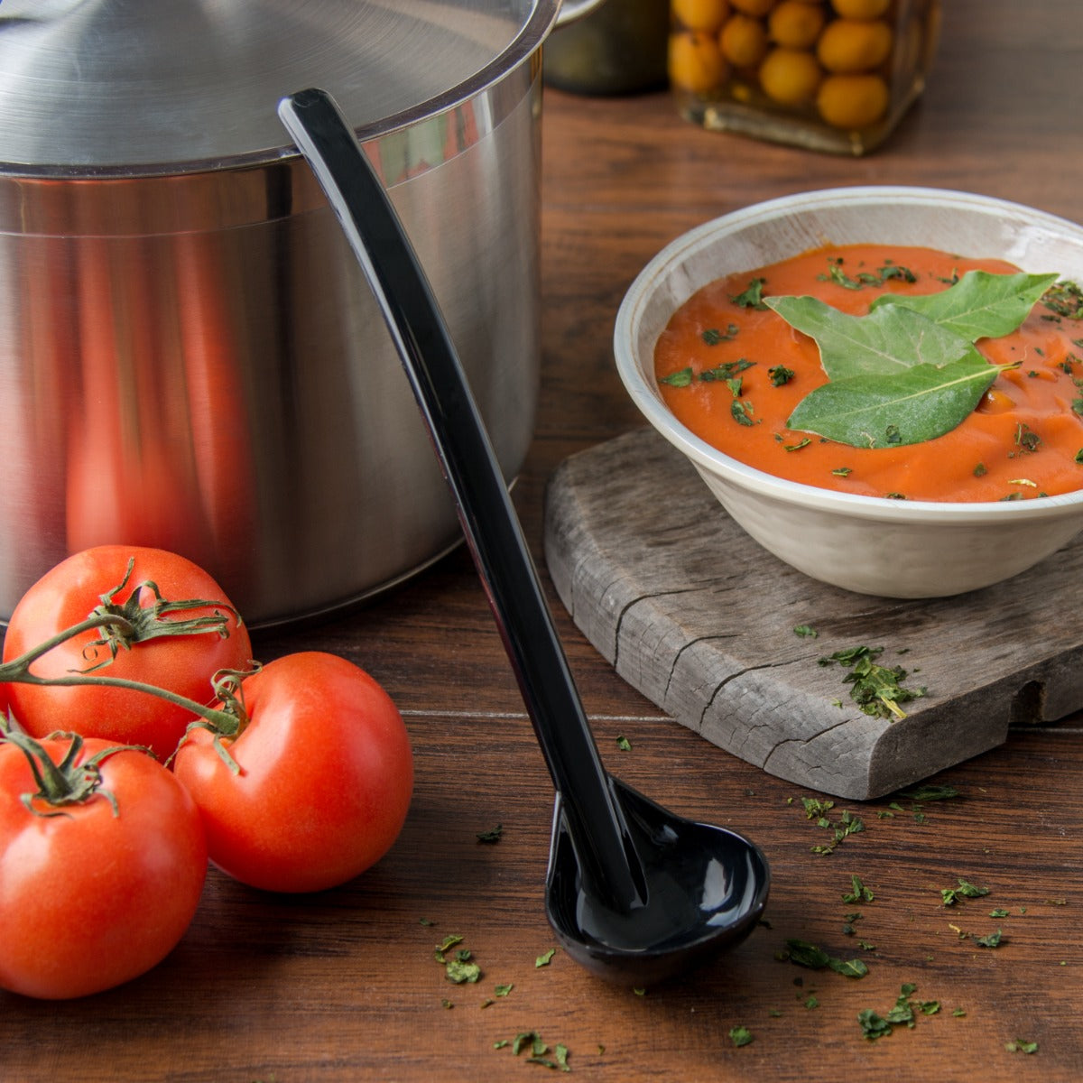 Carlisle 029503 Carly One-Piece Plastic Oval-Bowl Salad Dressing Ladle 1 oz. - 9-1/2"L - Black