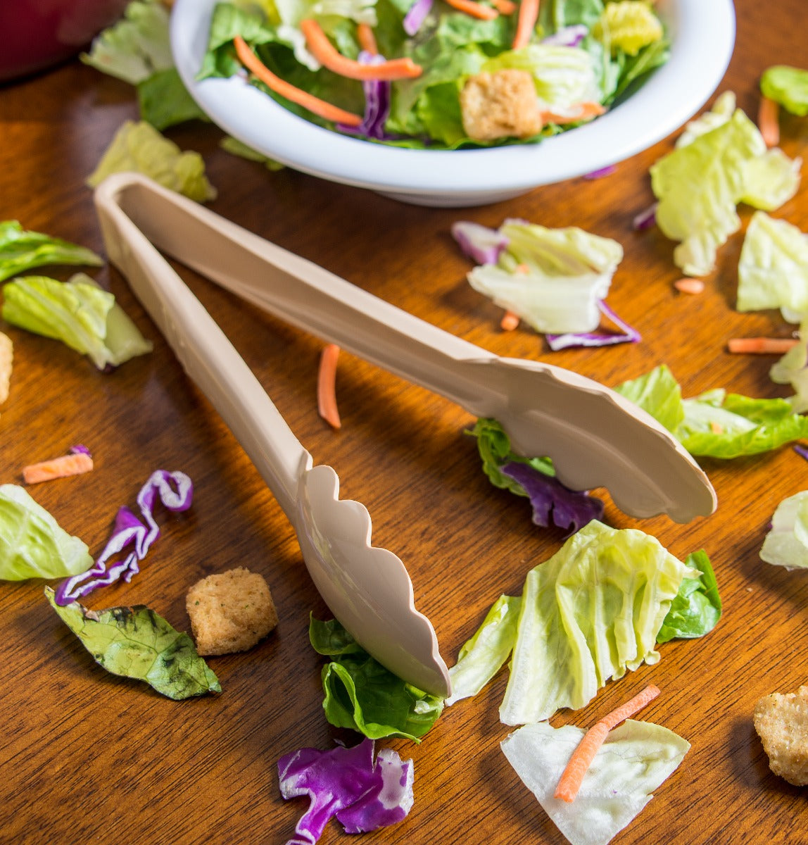 Carlisle 470906 Carly 1-Piece Plastic Scalloped Utility Tongs 9" - Beige