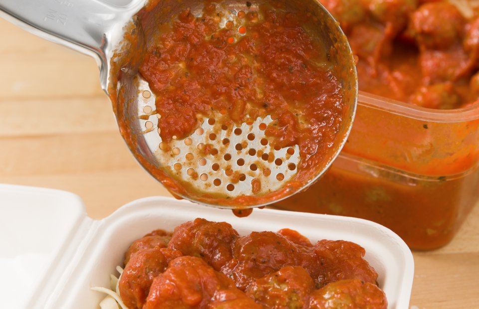 Vollrath 6432865 Jacob's Pride Color-Coded One-Piece Heavy-Duty Stainless Steel Perforated Round Spoodle Food Portioner with Orange Nylon Handle 8 oz.