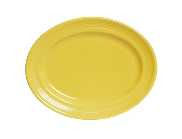 Tuxton CSH-096 9 3/4" x 6 1/2" Oval Concentrix®© Platter - Ceramic, Saffron - 2ea/Case