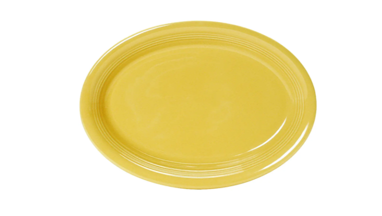 Tuxton CSH-1142 11 1/2" x 8 3/4" Oval Concentrix®© Platter - Ceramic, Saffron