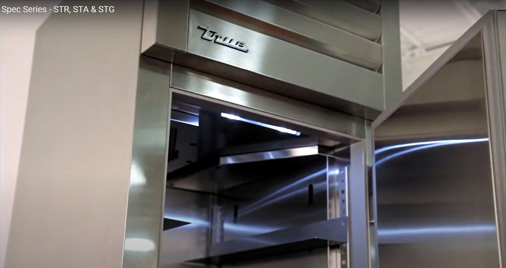 True STA1DT-2HS-HC Spec Series 1-Section 2 Solid Half Door Dual Temp Reach-In Refrigerator / Freezer 27" - 115v