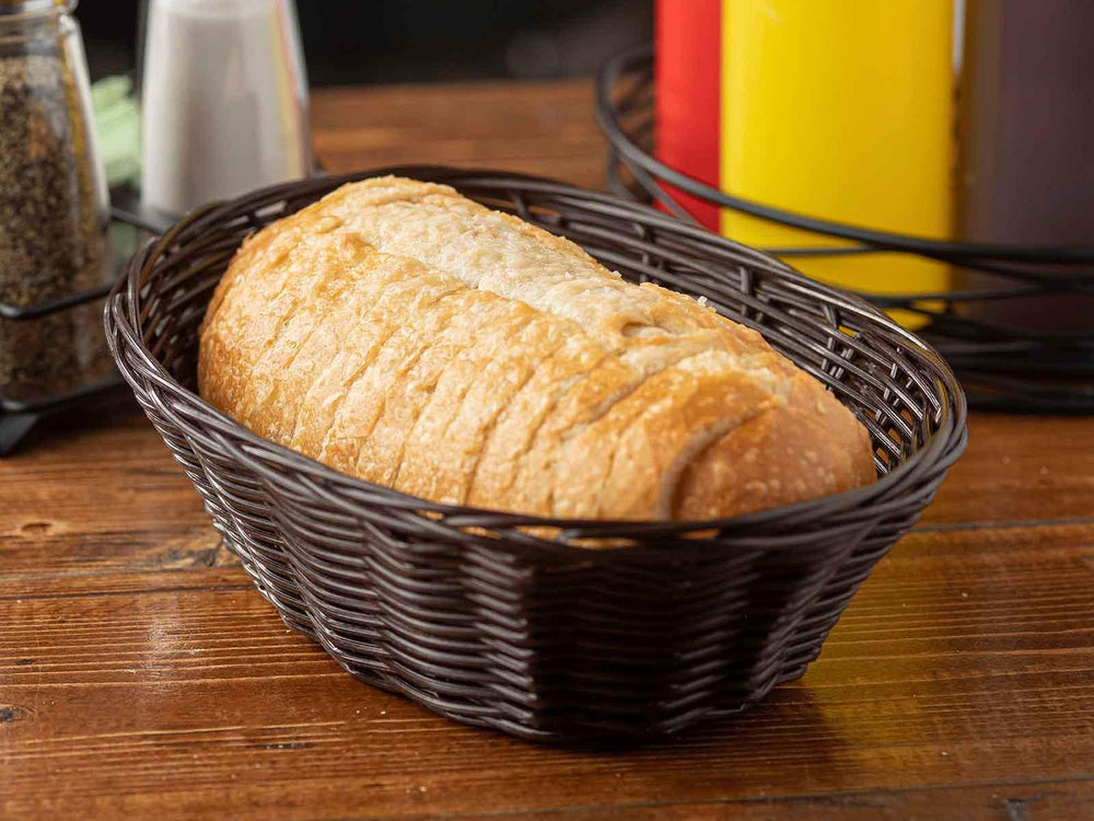 TableCraft 1474 Handwoven Ratan Oval Serving Basket 9" x 6" x 2-1/4" - Brown - 12/Case