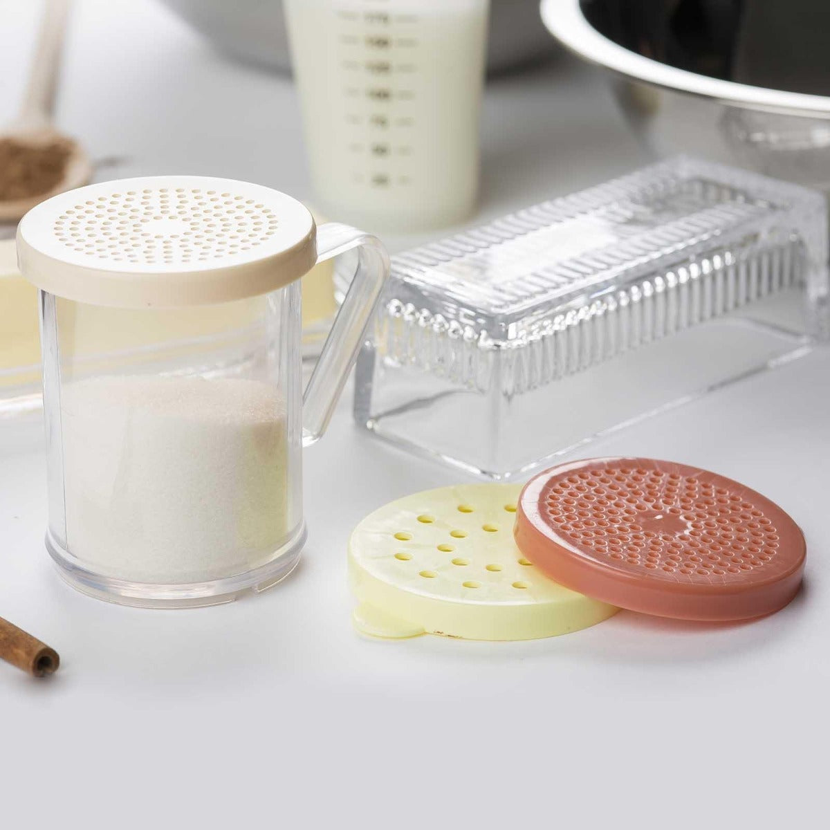 TableCraft 166A Plastic Dredge / Shaker with Handle and Beige Snap-Top "Salt & Pepper" Lid 10 oz. - Clear - 12/Case