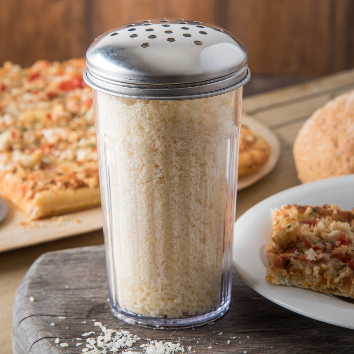 Carlisle 331907 Fluted Plastic Cheese Shaker with Stainless Steel Perforated Top 12 oz. - Clear