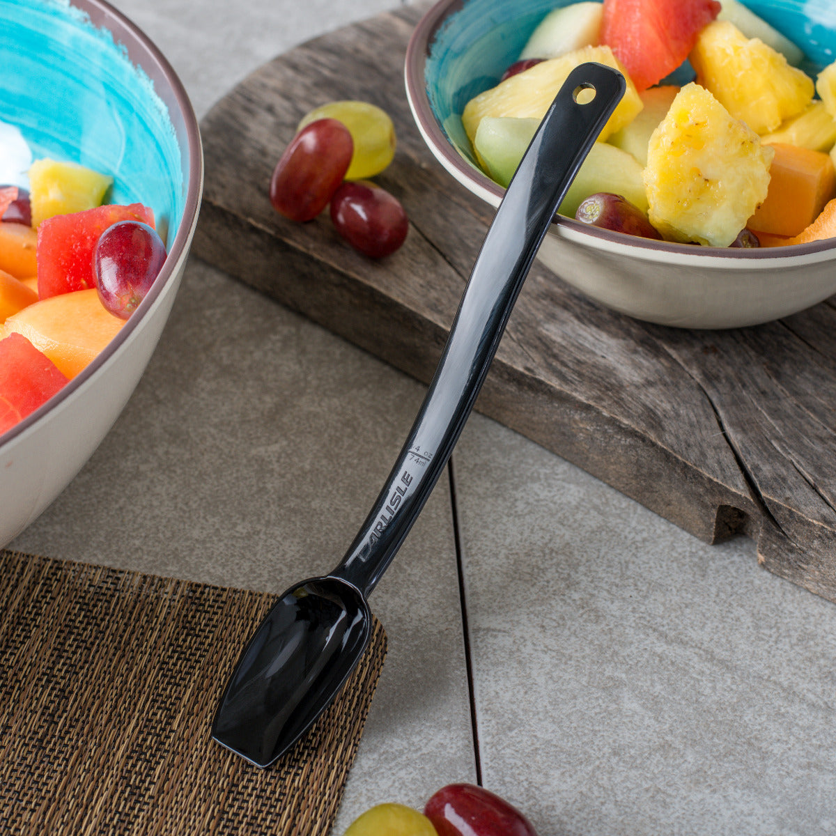 Carlisle 445003 One-Piece Plastic Solid Salad/Buffet Serving Spoon with Notched handle 8" - 1/4 oz. - Black