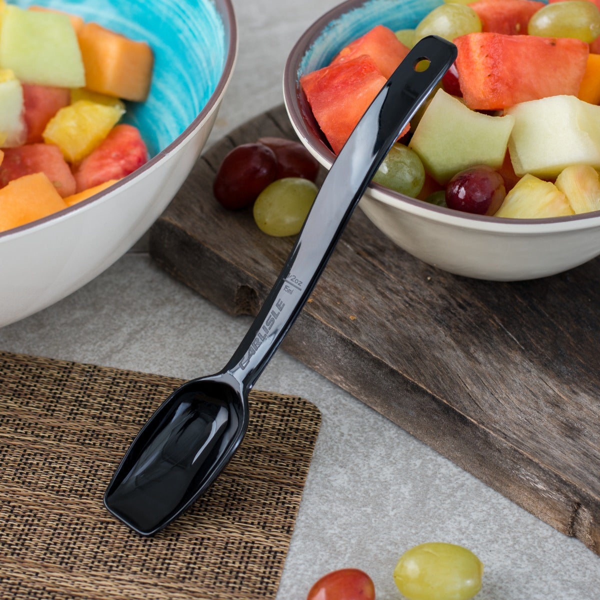 Carlisle 446003 One-Piece Plastic Solid Salad/Buffet Serving Spoon with Notched handle 9" - 1/2 oz. - Black
