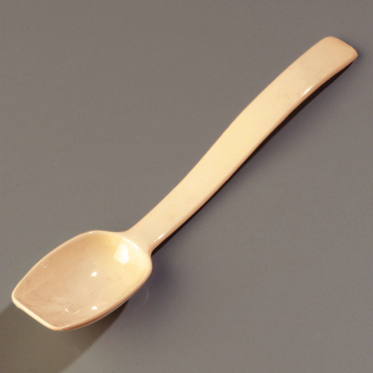 Carlisle 446006 One-Piece Plastic Solid Salad/Buffet Serving Spoon with Notched handle 9" - 1/2 oz. - Beige