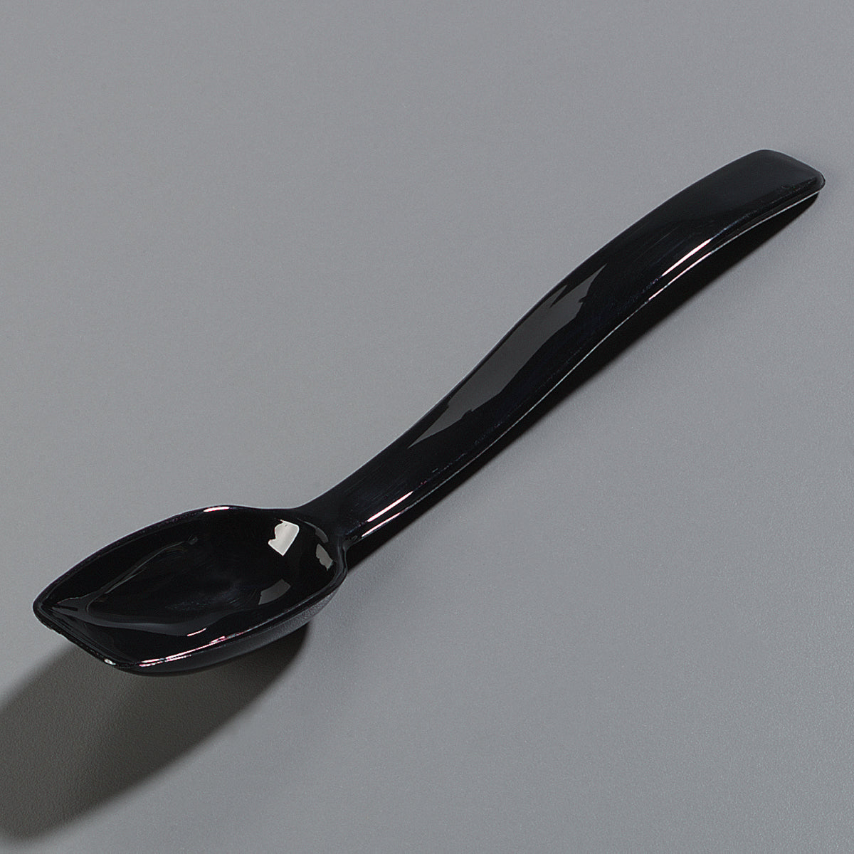 Carlisle 446003 One-Piece Plastic Solid Salad/Buffet Serving Spoon with Notched handle 9" - 1/2 oz. - Black