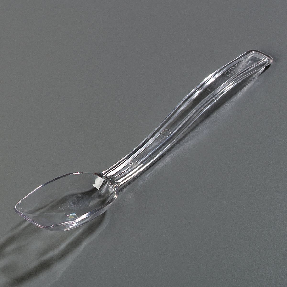Carlisle 446007 One-Piece Plastic Solid Salad/Buffet Serving Spoon with Notched handle 9" - 1/2 oz. - Clear