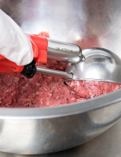 Vollrath 47397 Jacob's Pride Standard Length Disher with Red Squeeze Handle 1.52 oz. - Size 24 - 12/Case