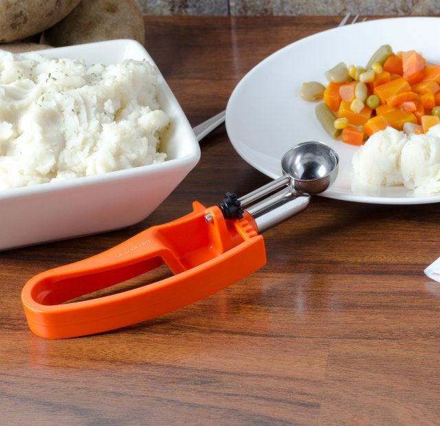 Vollrath 47404 Jacob's Pride Standard Length Disher with Orange Squeeze Handle 0.33 oz. - Size 100