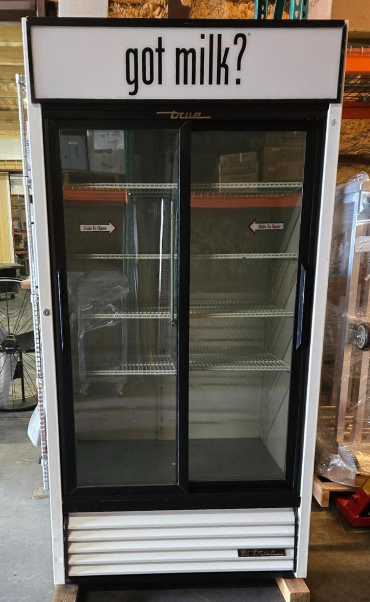 Used Restaurant Equipment - True GDM-33 White 2-Section 2 Glass Slide Door Merchandiser Refrigerator with "Got Milk?" Sign Panel 40" - 115v