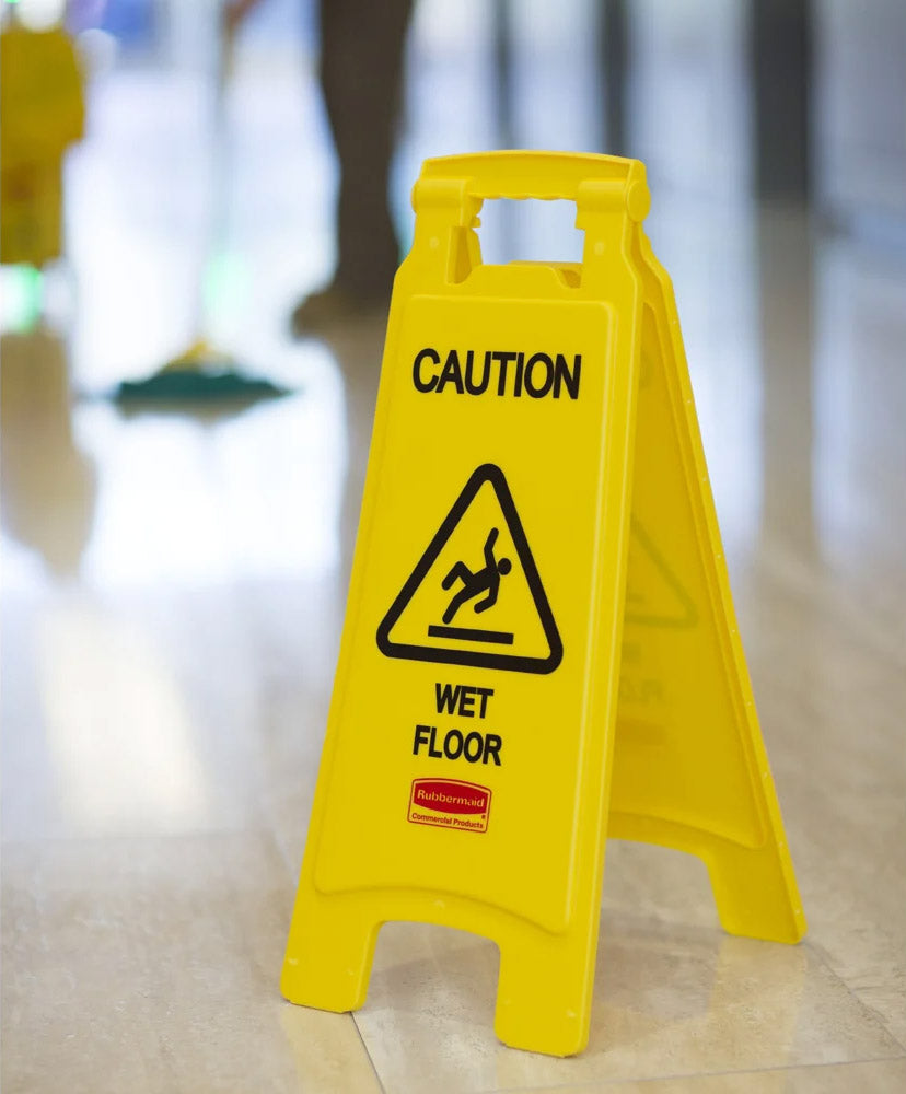 Rubbermaid FG611277YEL 2-Sided "Caution Wet Floor" Floor Safety Sign 26" - Yellow