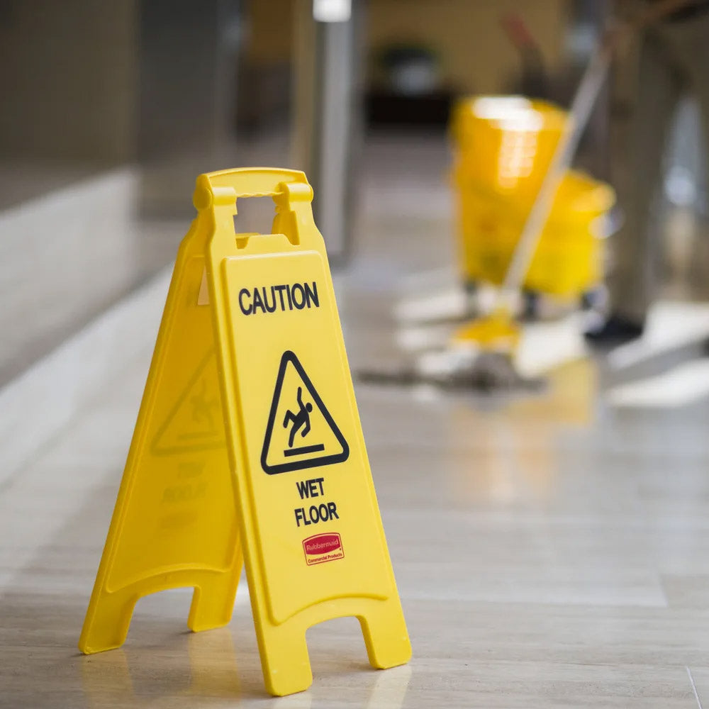 Rubbermaid FG611277YEL 2-Sided "Caution Wet Floor" Floor Safety Sign 26" - Yellow