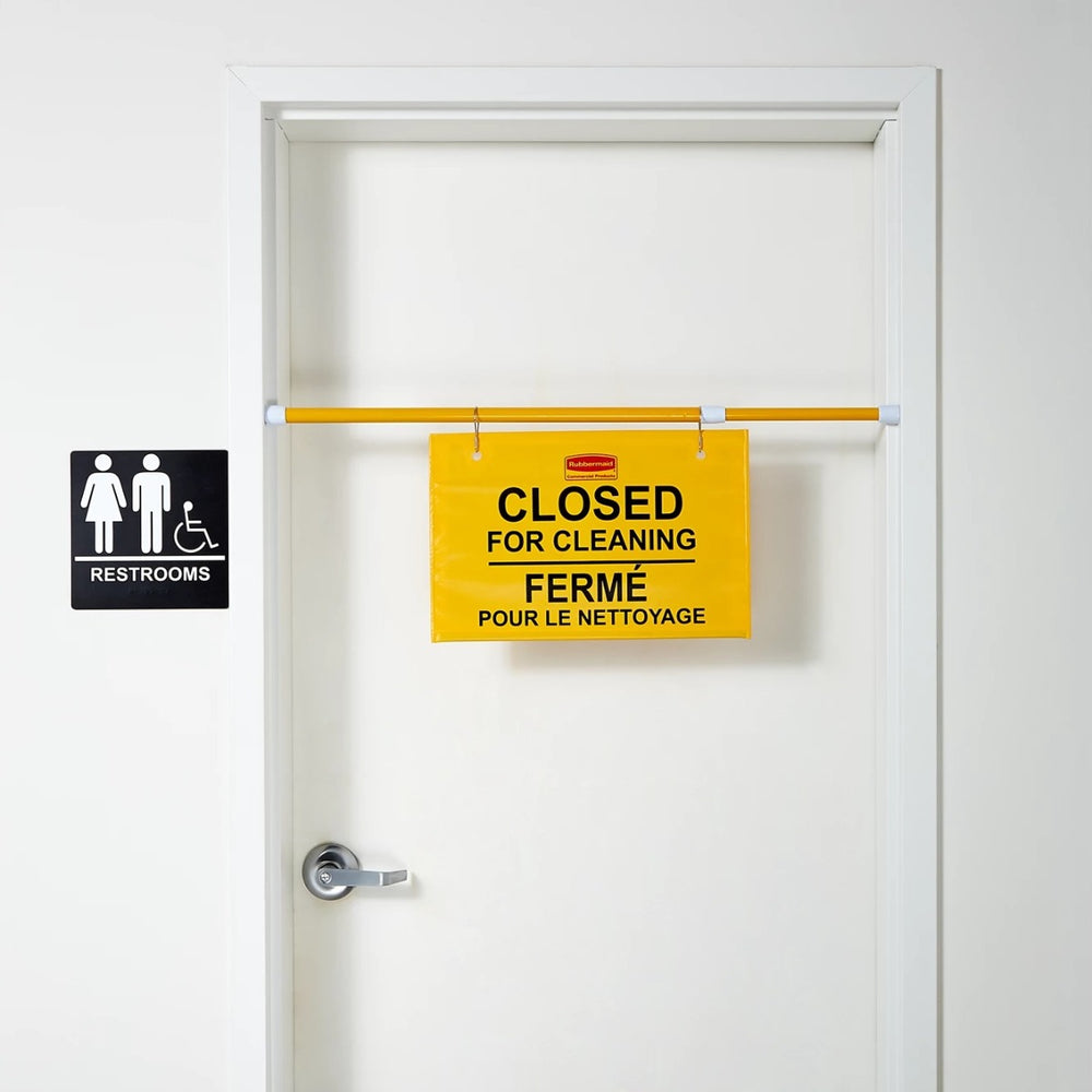 Rubbermaid FG9S1600YEL Multi-Lingual "Closed For Cleaning" Hanging Doorway Safety Sign 44"W x 13"H - Yellow