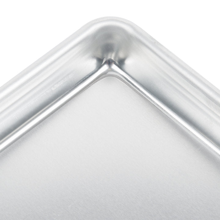 Vollrath 5228 Wear-Ever Eighth Size 16 Gauge 6 1/2" x 9 1/2" Curled Rim, No Wire Aluminum Bun / Sheet Pan