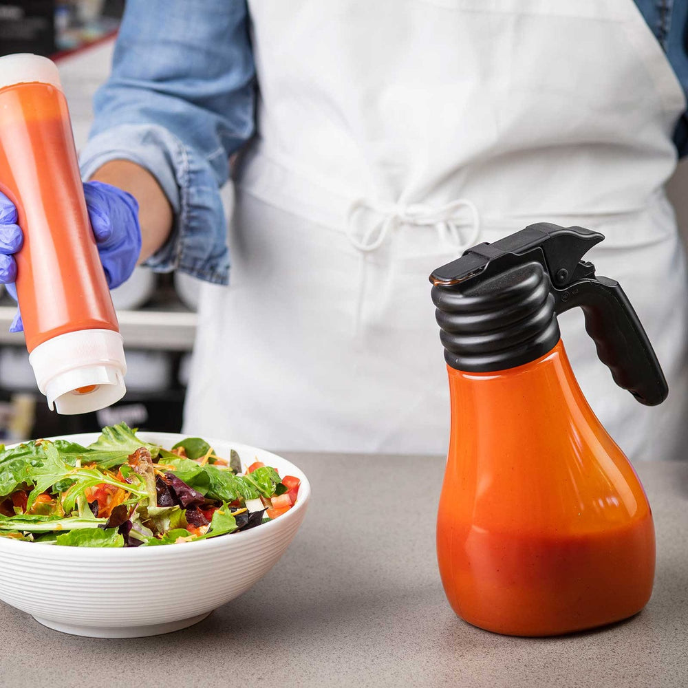 TableCraft N48 Option Polycarbonate Salad Dressing Dispenser with Black Plastic Top and (1) Blank Tag 48 oz. - Clear