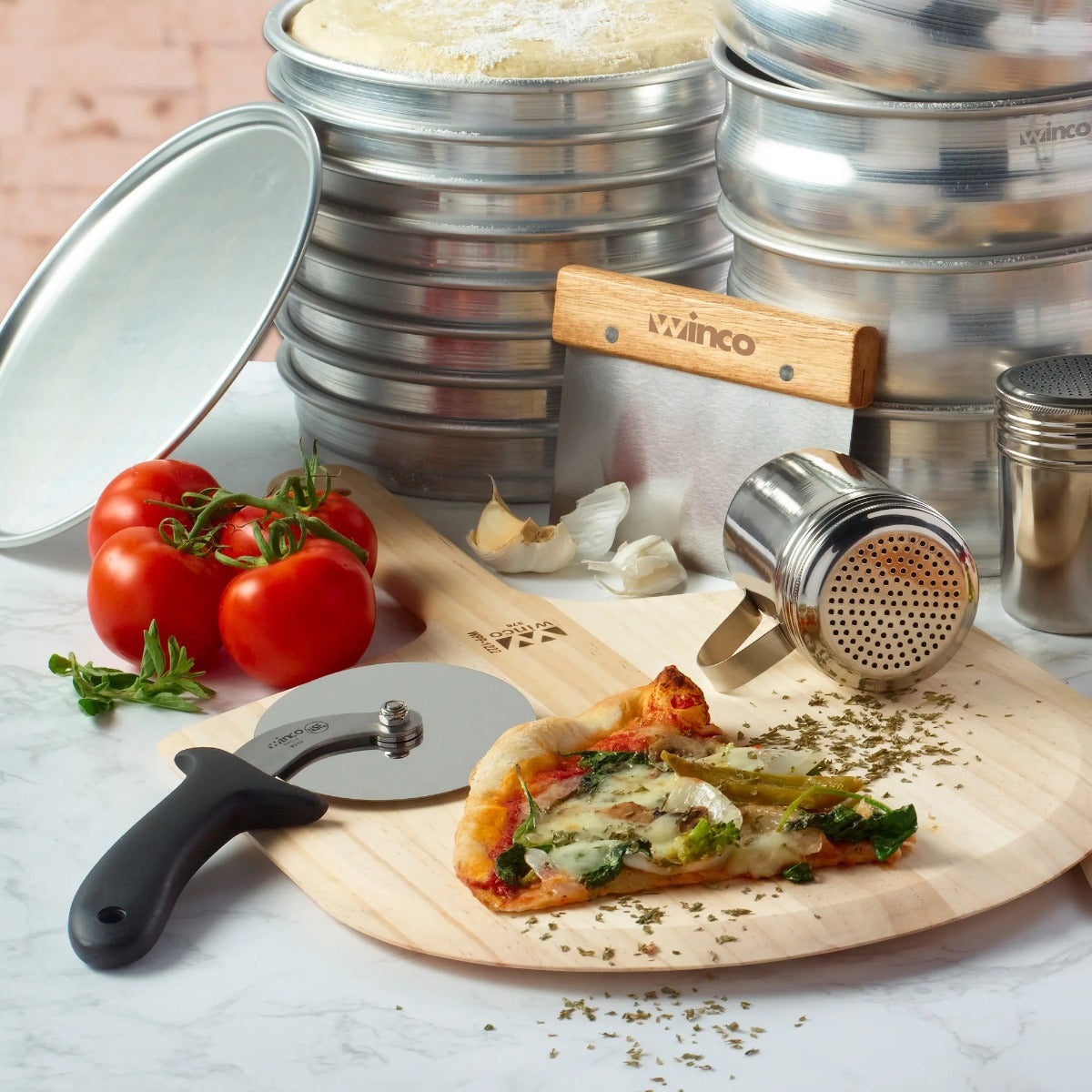 Winco PPC-4 Stainless Steel Pizza Cutter with 4" dia. Blade and Black Plastic Handle - 12/Case