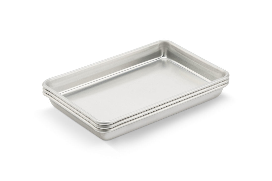 Vollrath 5228 Wear-Ever Eighth Size 16 Gauge 6 1/2" x 9 1/2" Curled Rim, No Wire Aluminum Bun / Sheet Pan